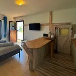 Abajo, Casa Daire La Costa