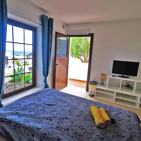 Abajo, Casa Apartment La Costa