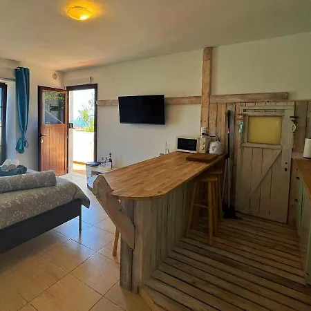Abajo, Casa Apartment La Costa