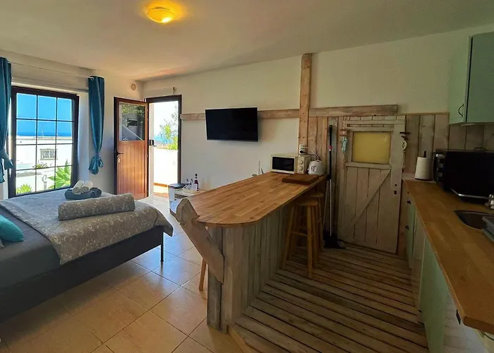 Abajo, Casa Lägenhet La Costa